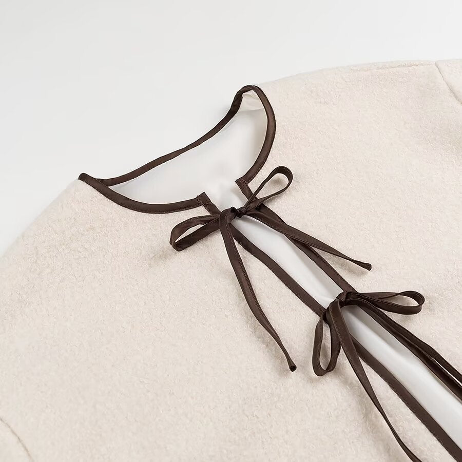 Round neck lace up contrasting edge pocket jacket for women
